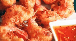 Brochettes de crevettes à la noix de coco et gelée de poivron rouge fumé.