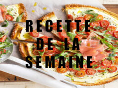 Pizza fine au fromage frais, tomates cerise, roquette et jambon cru.